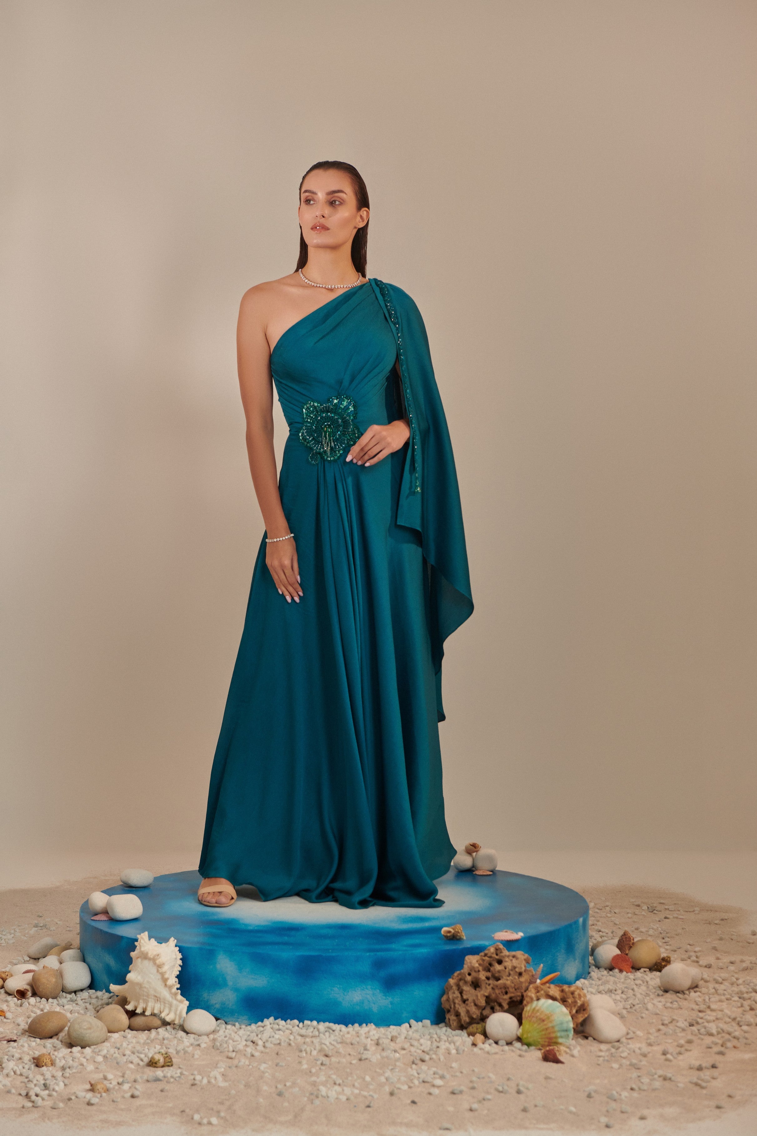 Teal one shoulder drape gown