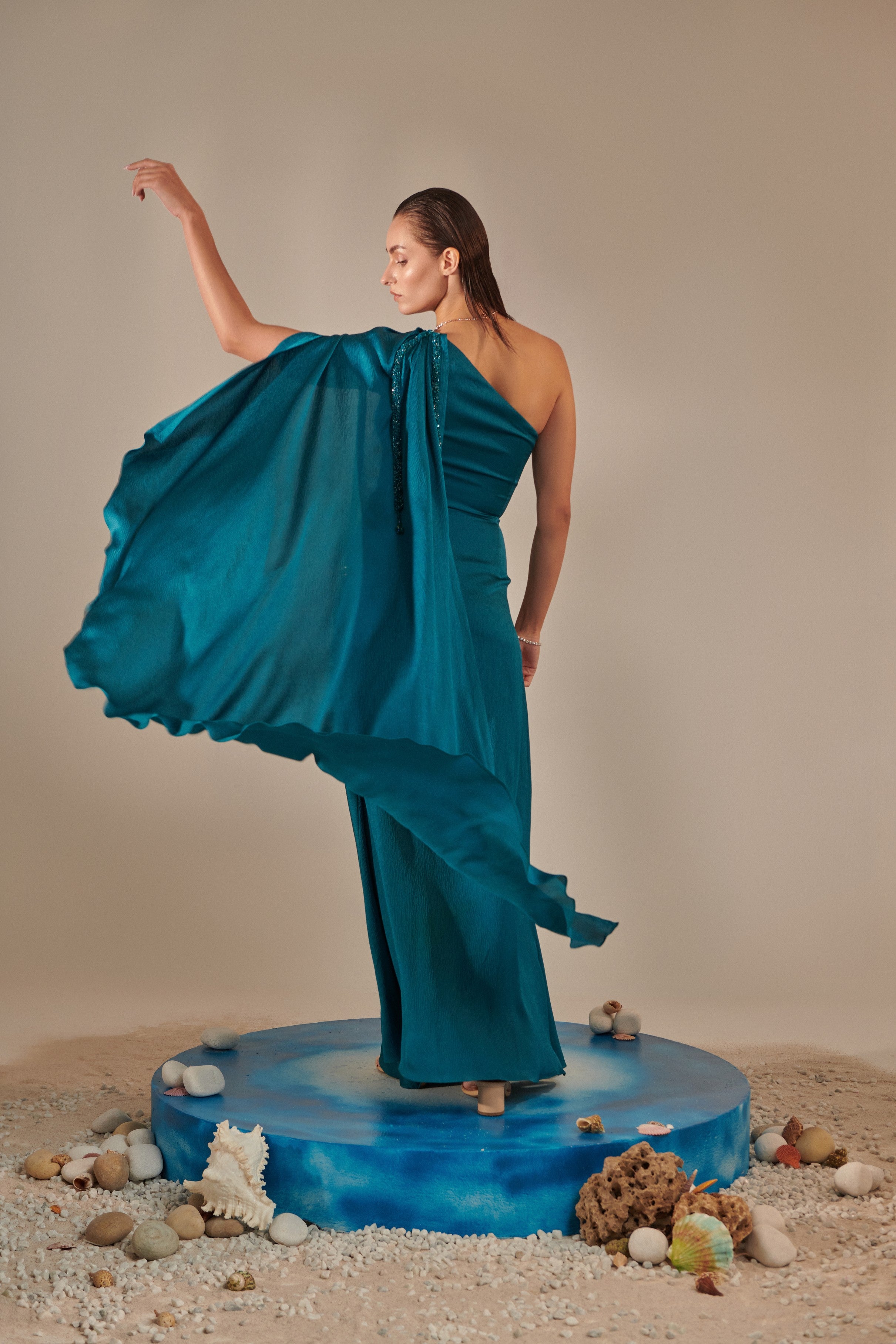Teal one shoulder drape gown