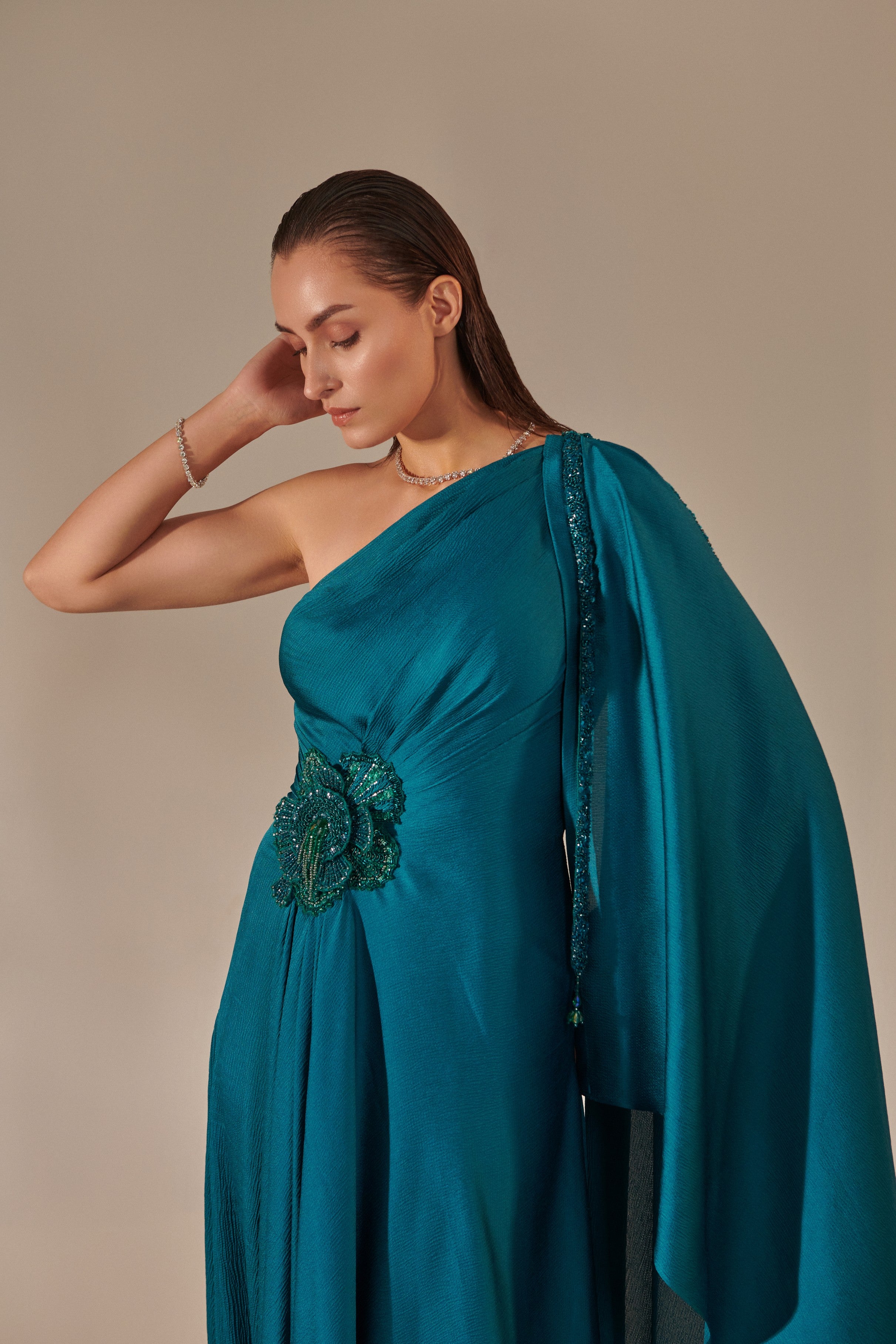 Teal one shoulder drape gown