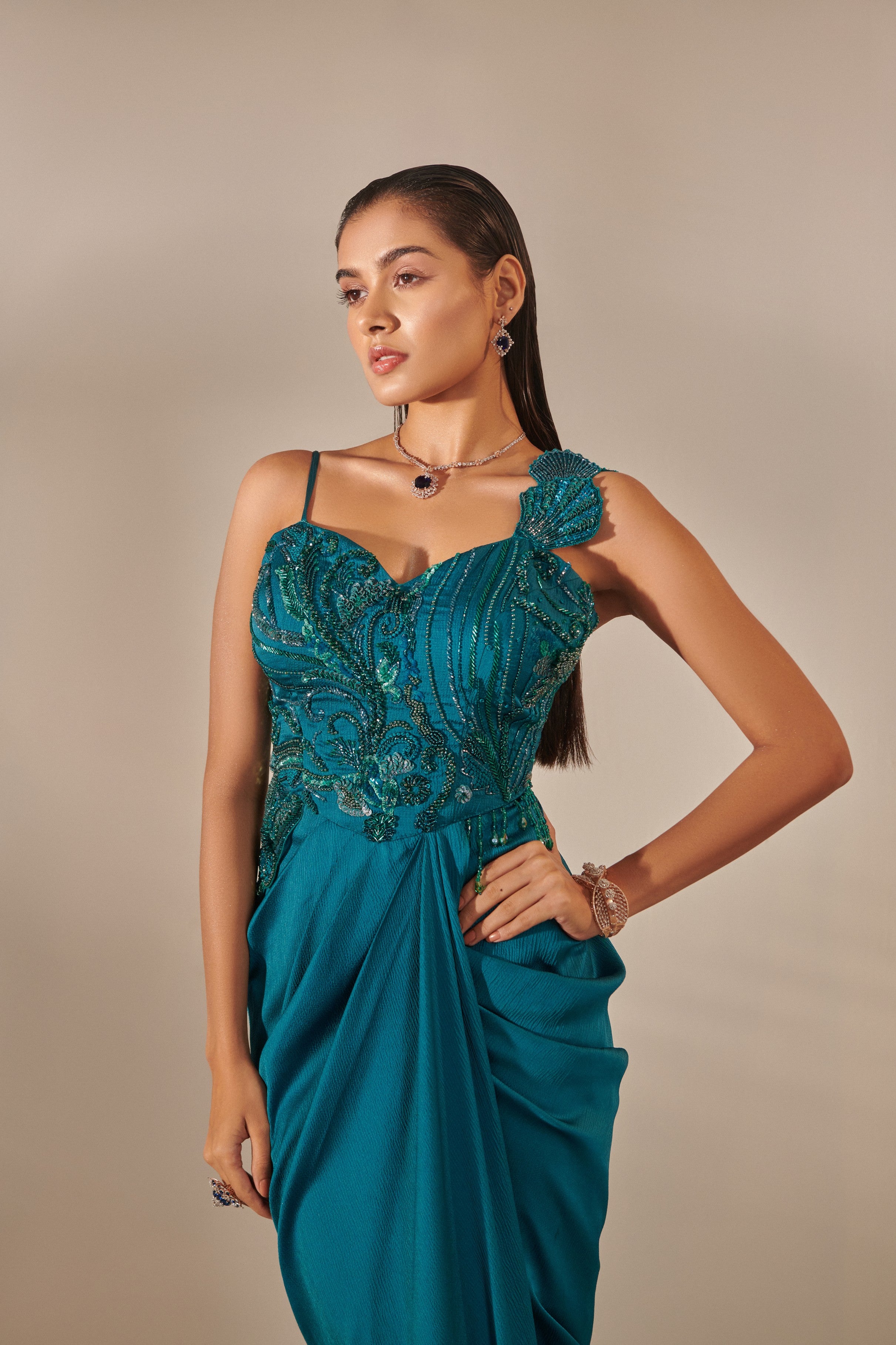 Teal drape gown ; hand embroidered; french knot detailing