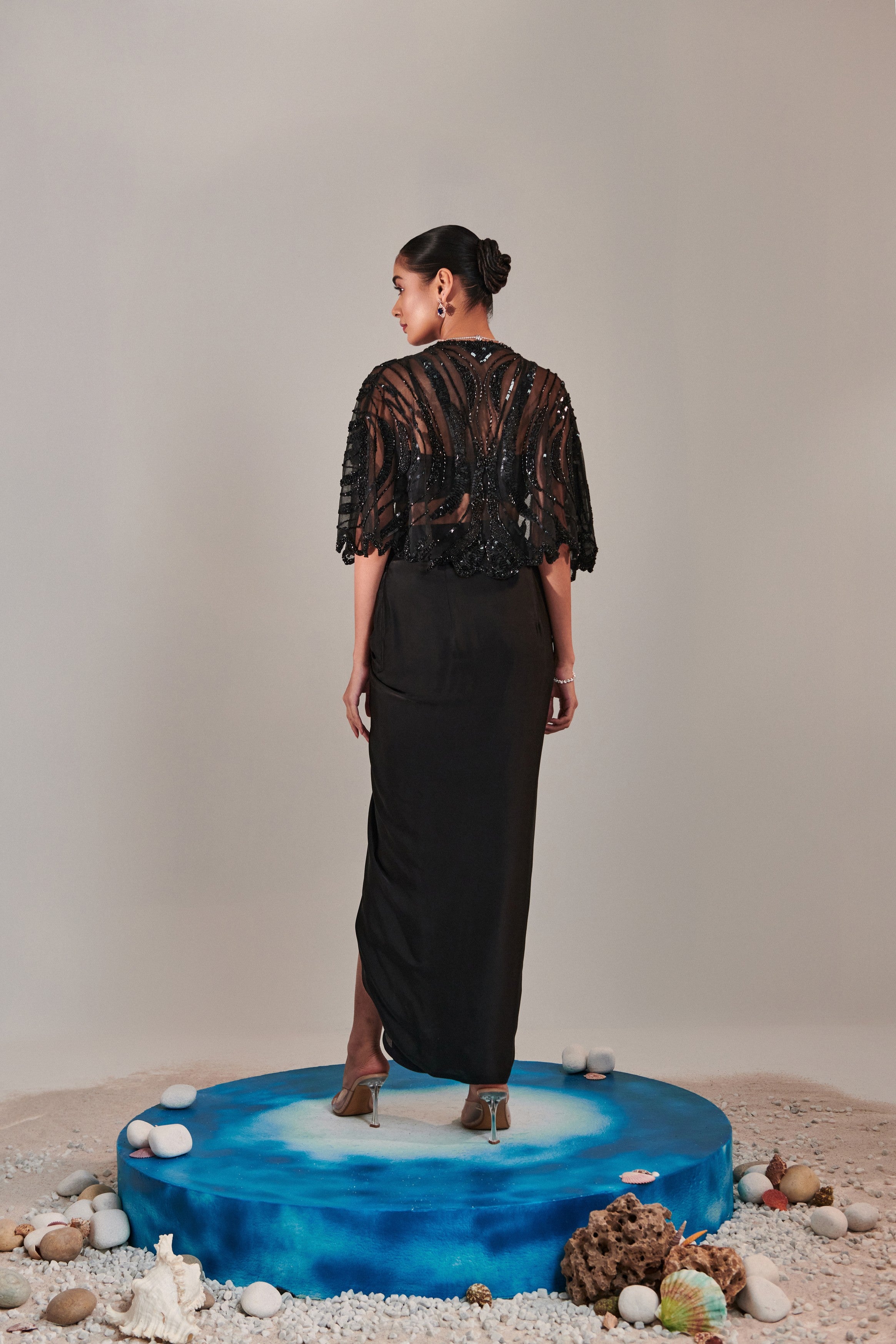 hand embroidered scallop short cape; asymmetric drape slit skirt; broad asymmetric waistbelt