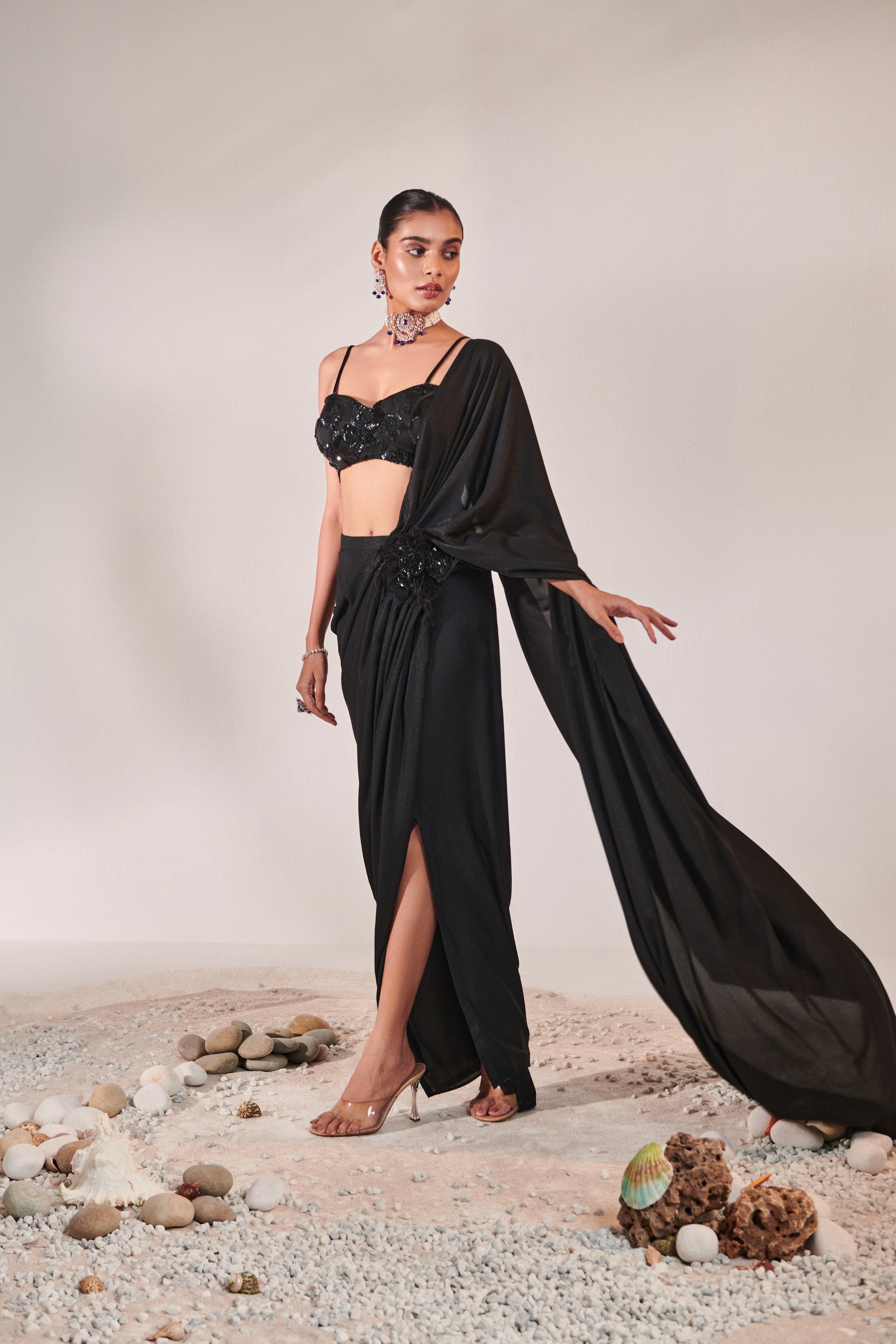 fuss-free pre-stitched drape saree; hand embroidered blouse and feather detailing
