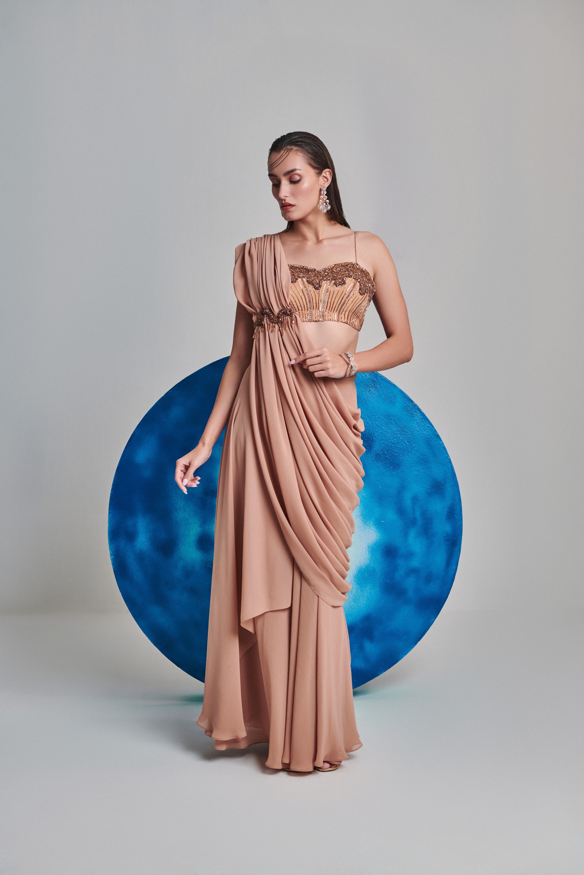 Beige flared pre stitch drape saree; hand embroidered blouse