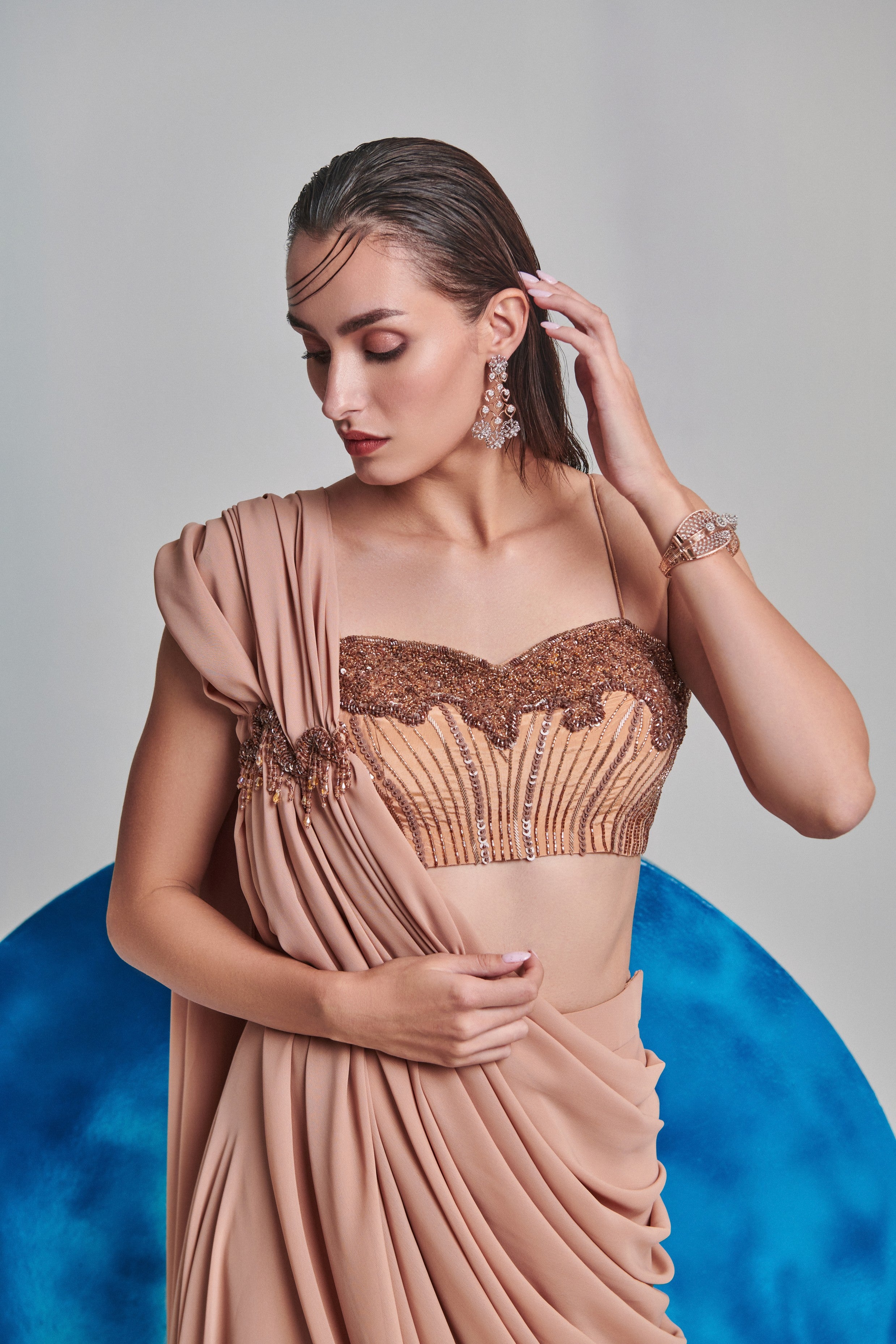 Beige flared pre stitch drape saree; hand embroidered blouse