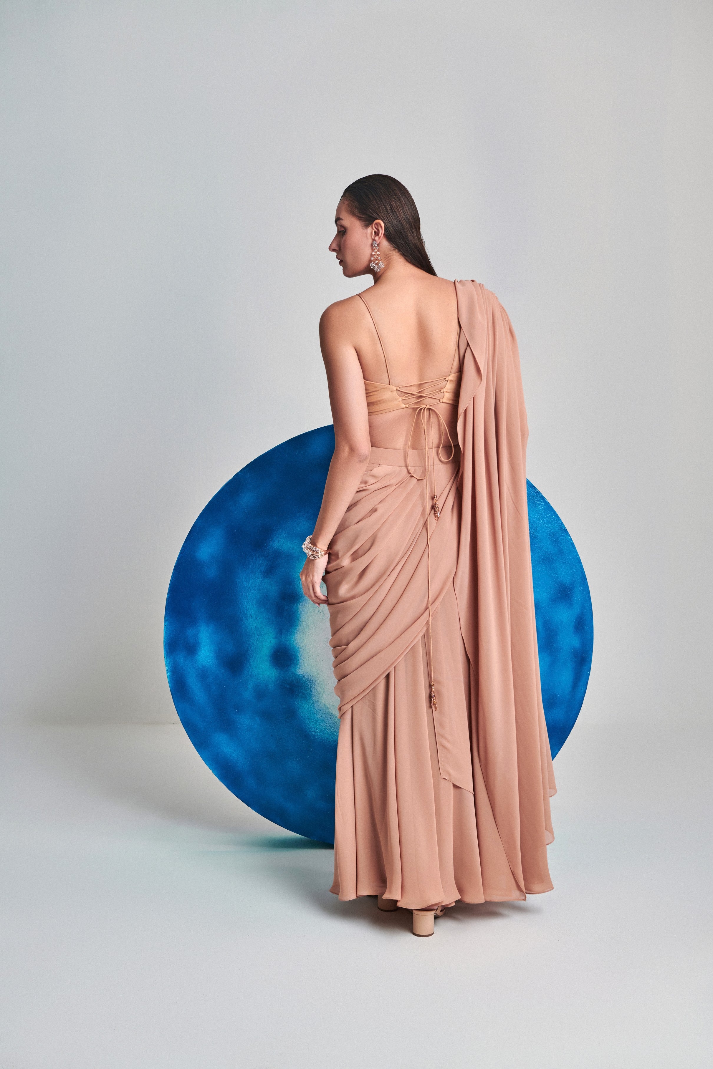 Beige flared pre stitch drape saree; hand embroidered blouse