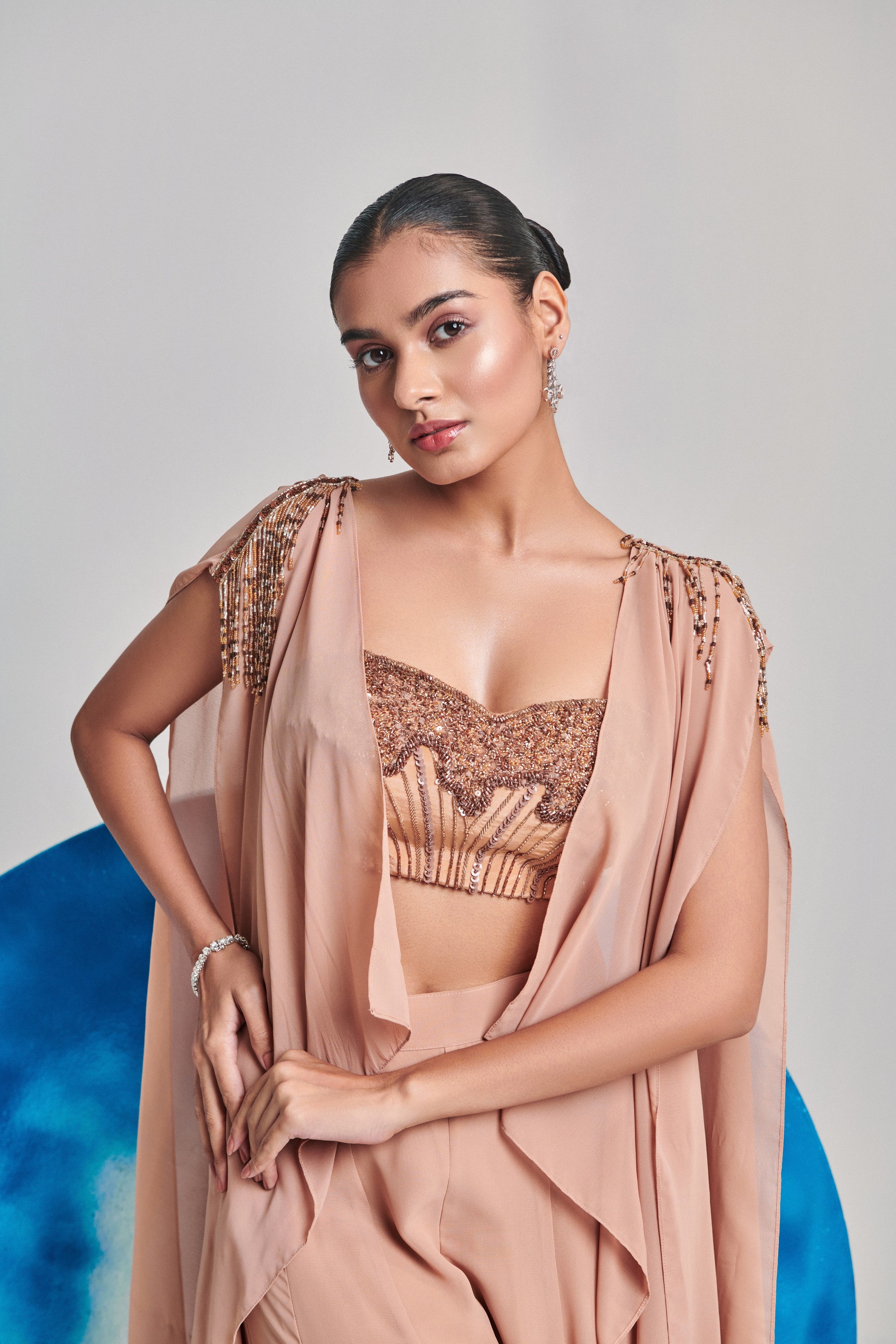 Beige open cape with embroider blouse and kalidar sharara