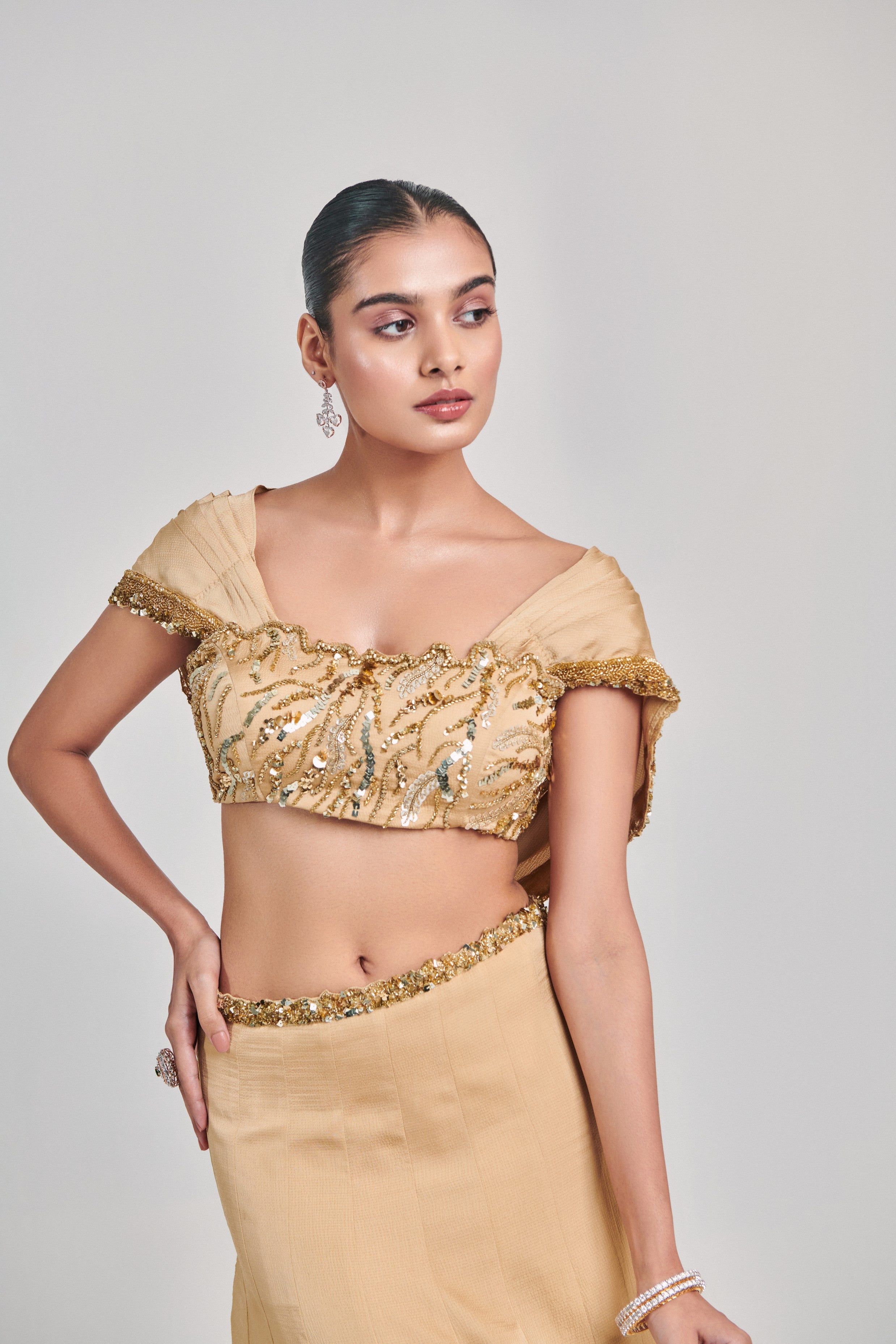 Golden cowl sleeves; cutwork blouse kalidar skirt set