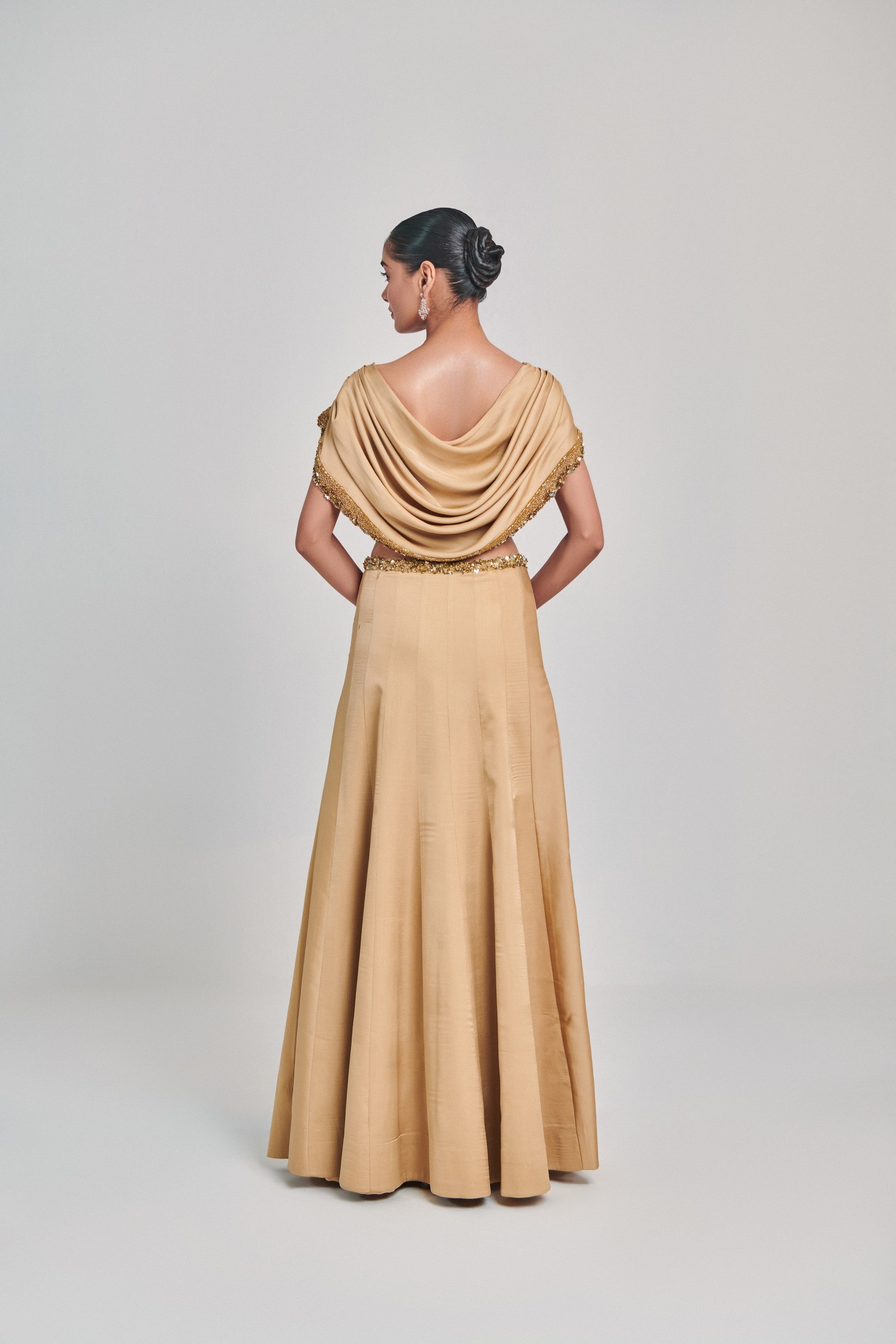 Golden cowl sleeves; cutwork blouse kalidar skirt set