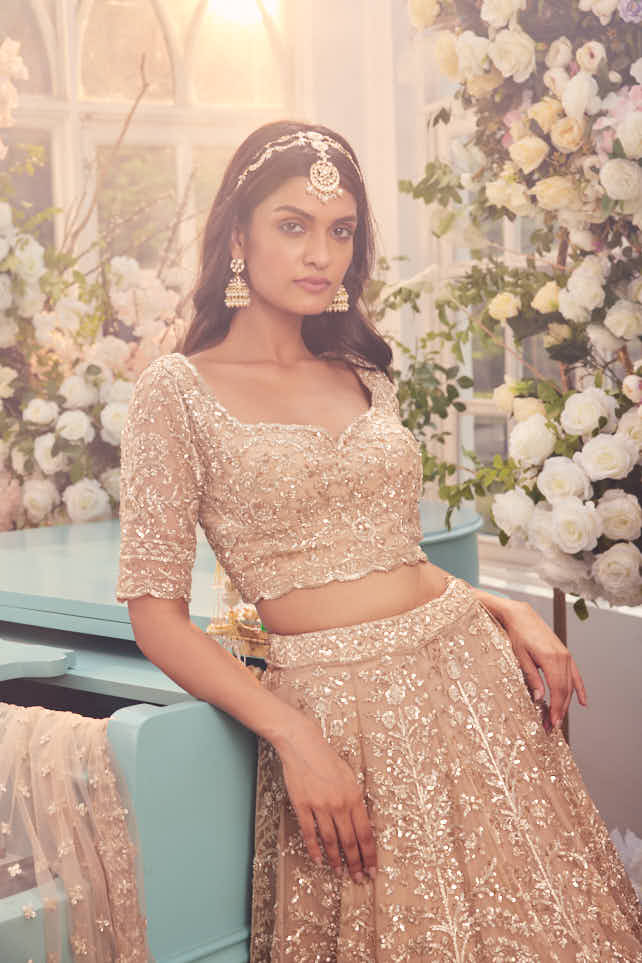 Gold organza hand embroidered lehenga
