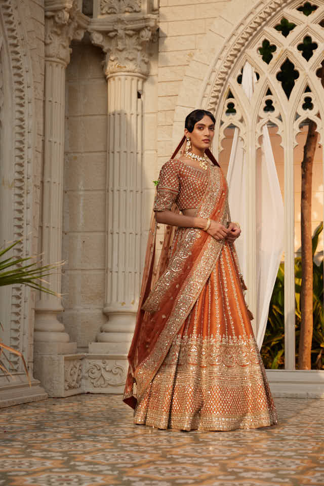 Rust embellished lehenga