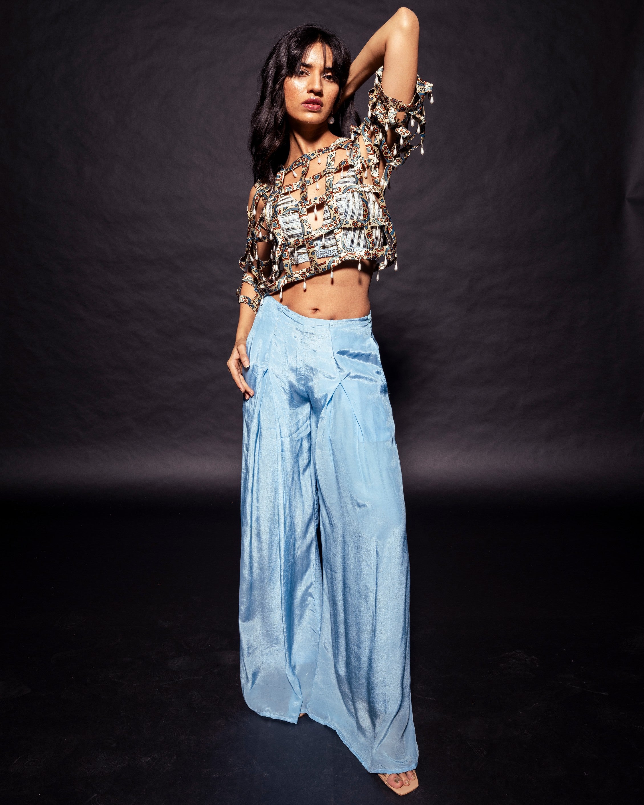 Powder blue ajrakh stripped jacket with embellished brallete and inverted pleated pants