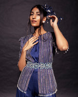 Deep blue side cowl jumpsuit with Ajrakh embellished jacket with patchwork waistbelt