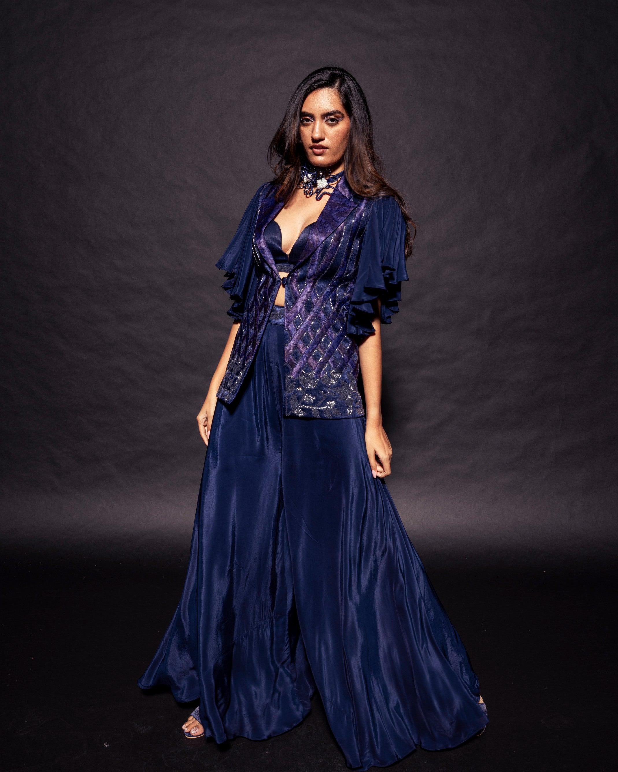 Deep blue ajrakh embellished jacket with embellished brallete and flare pants