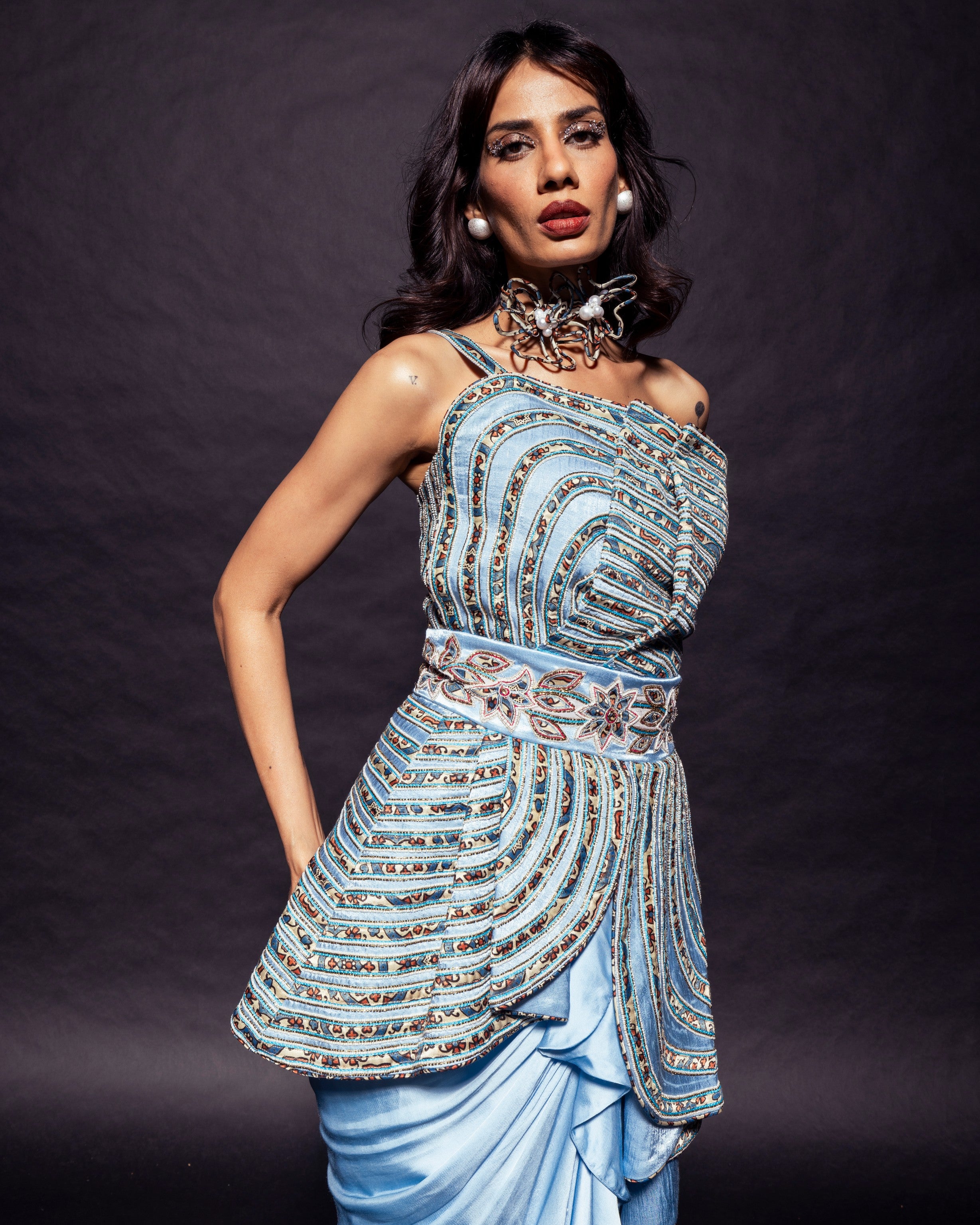 Powder blue ajrakh embroidered assymetric peplum top with Drape dhoti skirt