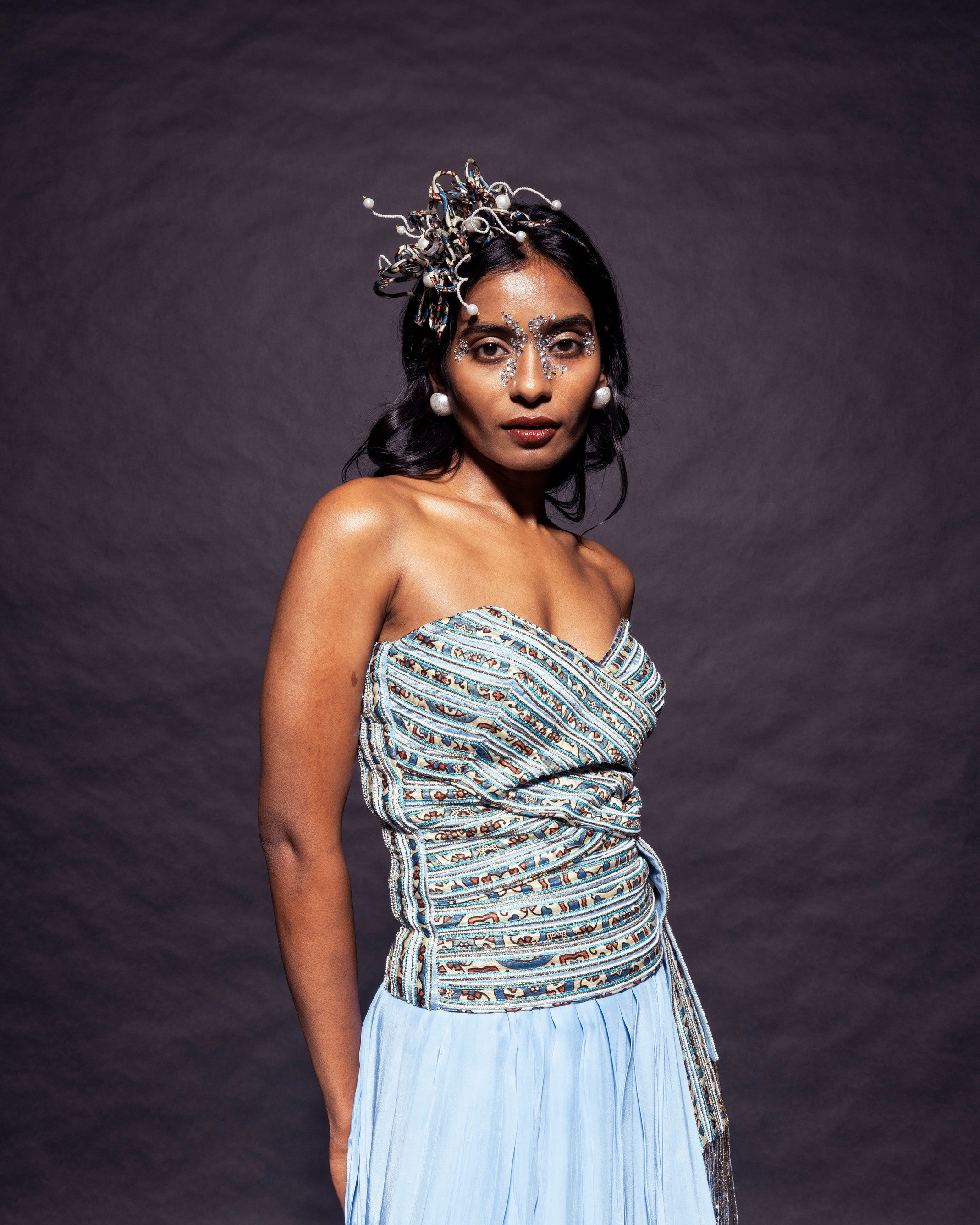 Powder blue ajrakh stripped corset with Pleated pants