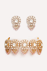 Bold and dramatic two tone finish polki choker set