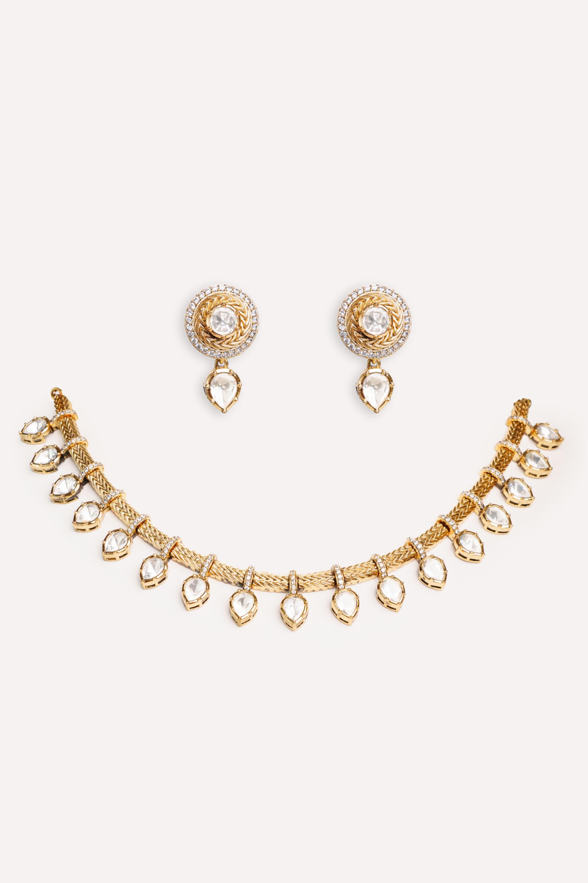 Dramatic and stylish kundan necklace set with matching earrings