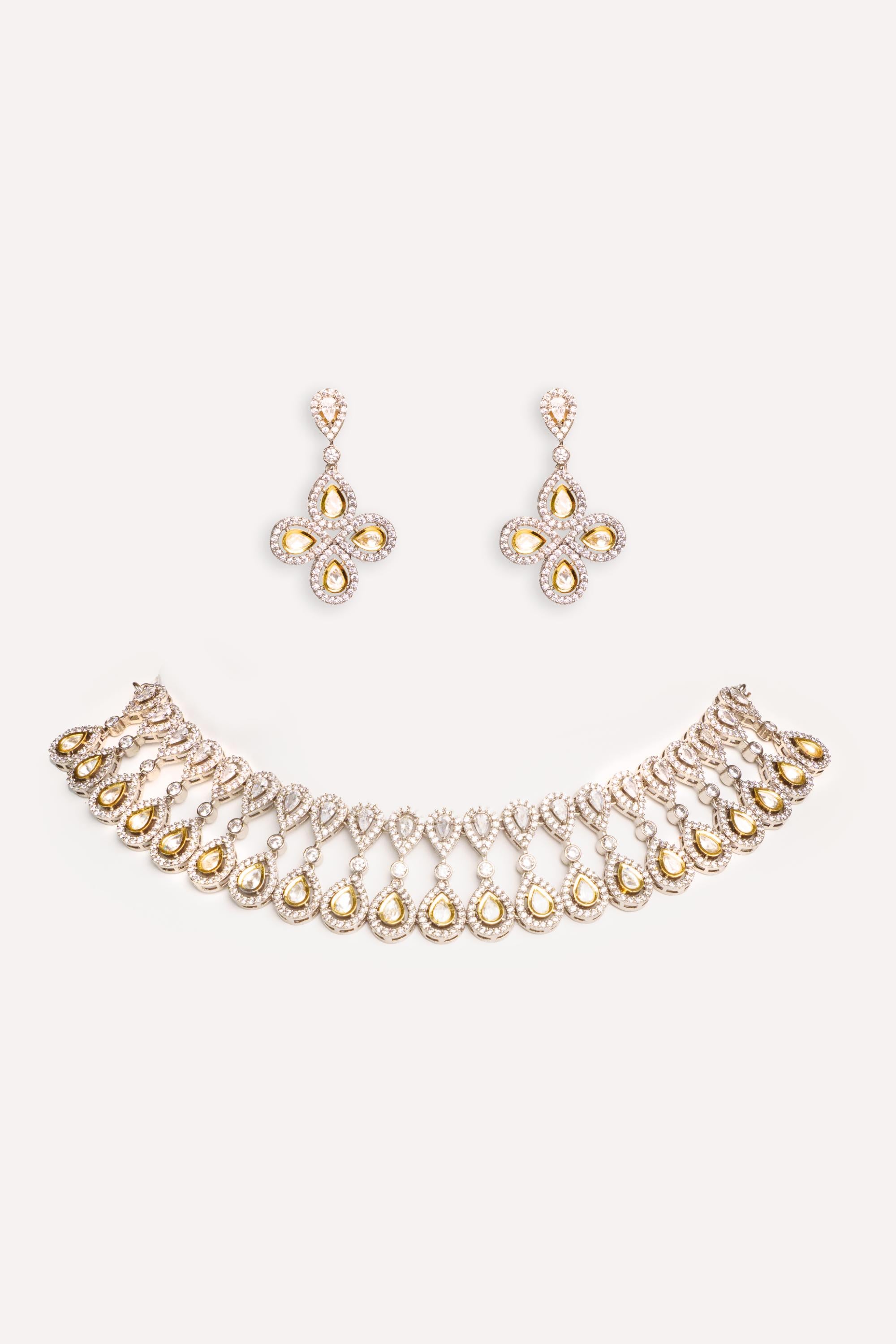 Dramatic and stylish zircon stone necklace set with matching earrings