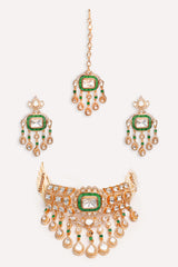 Bold and dramatic two tone finish polki choker set