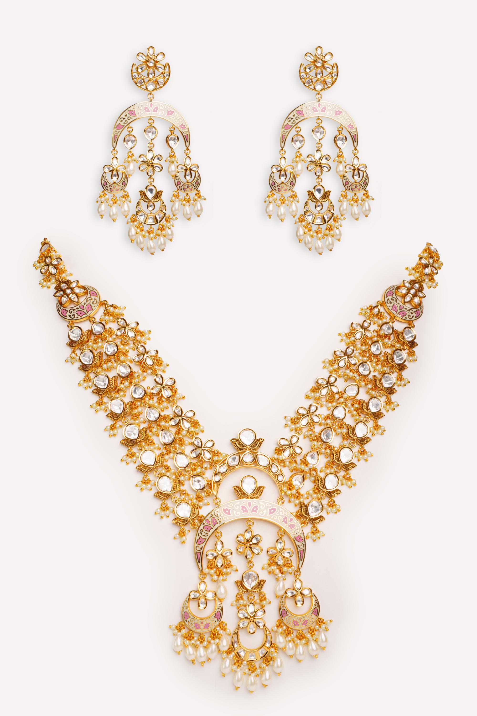 Bold and dramatic kundan long pendant necklace with elegant earrings