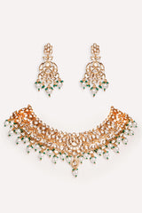 Elegant and classy kundan necklace set with earrings studded with pearls