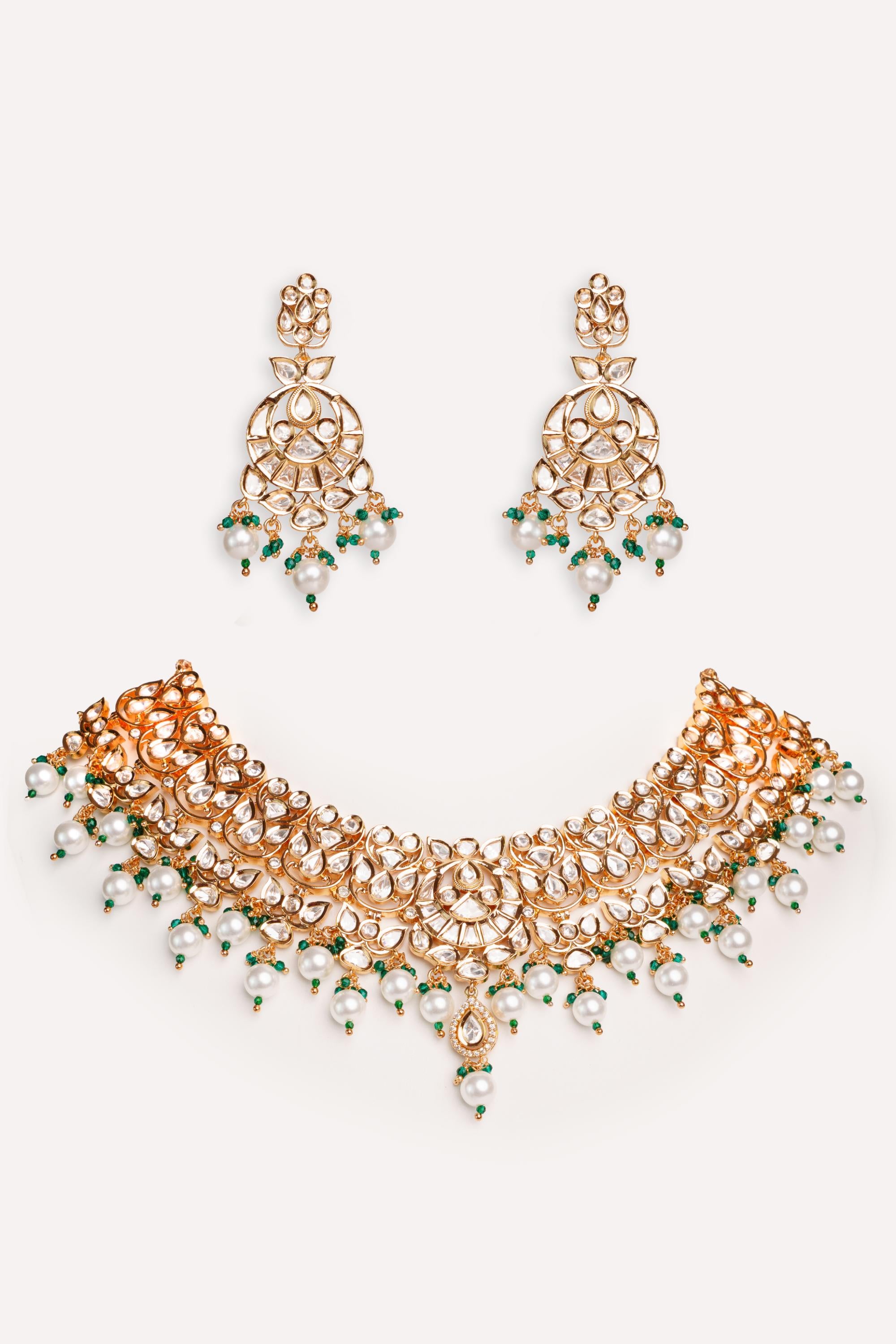 Elegant and classy kundan necklace set with earrings studded with pearls