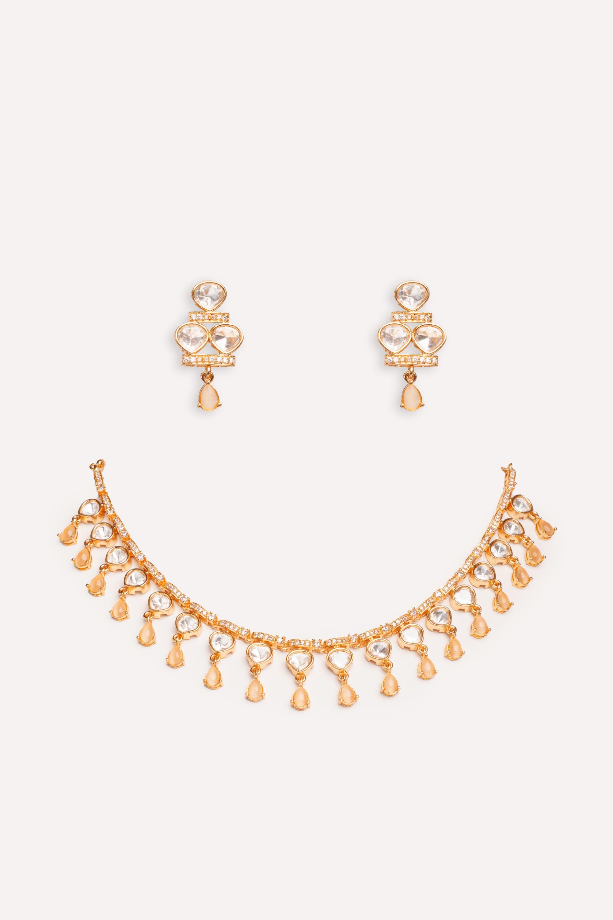Dramatic and stylish kundan necklace set with matching earrings