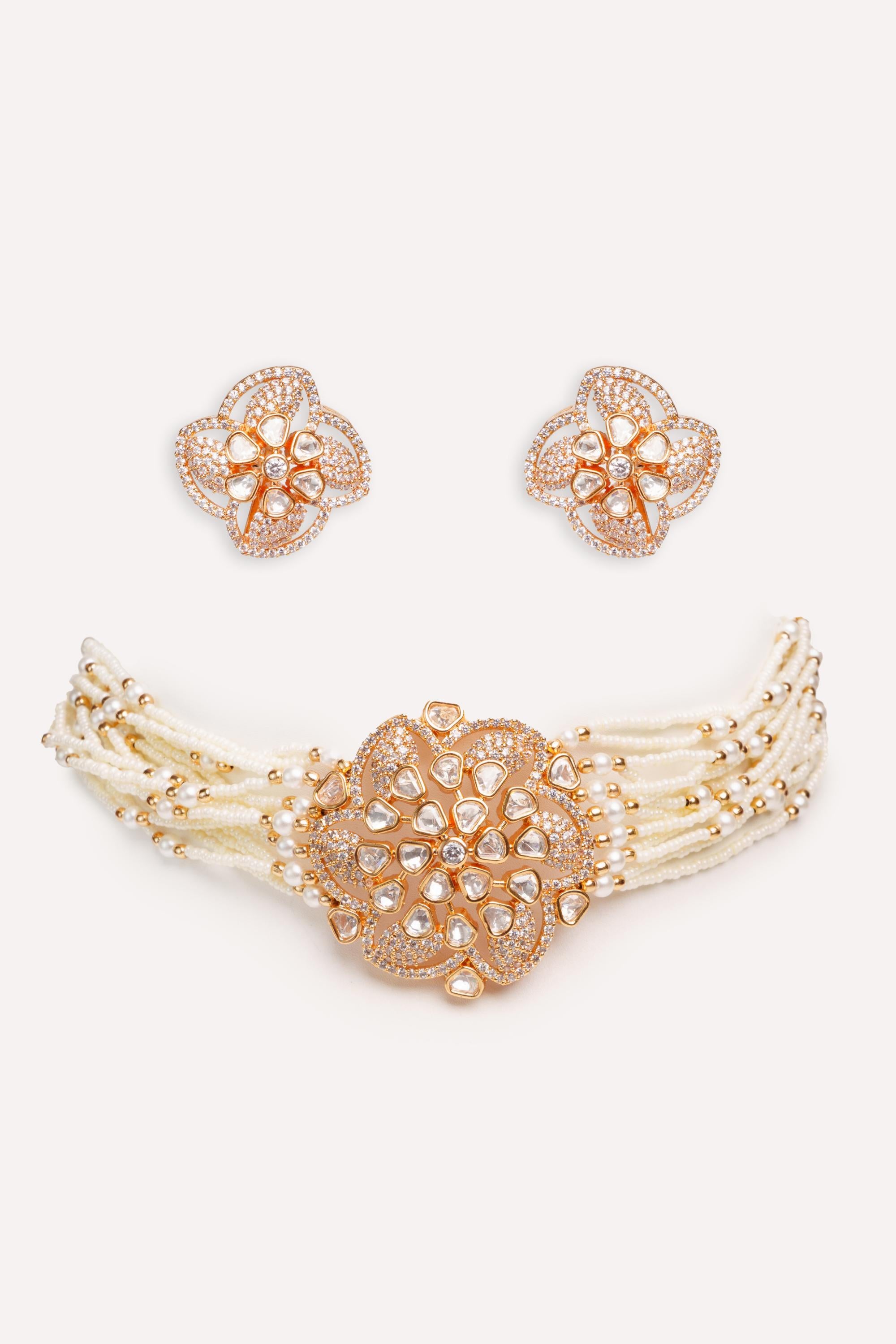 Classy kundan choker set with elegant pair of earrings.