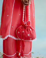 Coral Rose Potli Bag with pearl handle and beaded tassels for women