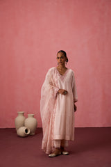 Cozy peach chanderi floral resham embroidered kurta paired with organic cotton slip, pant & organza dupatta