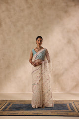 Ivory organza french knot cross stitch embroidered saree comes with unstitched & unembroidered blouse fabric in chanderi