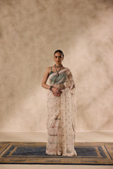 Ivory organza resham and thread embroidered saree comes with unstitched & unembroidered blouse fabric in chanderi