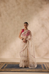 Ivory organza french knot jaal & paisley work saree comes with unstitched & unembroidered blouse fabric in chanderi