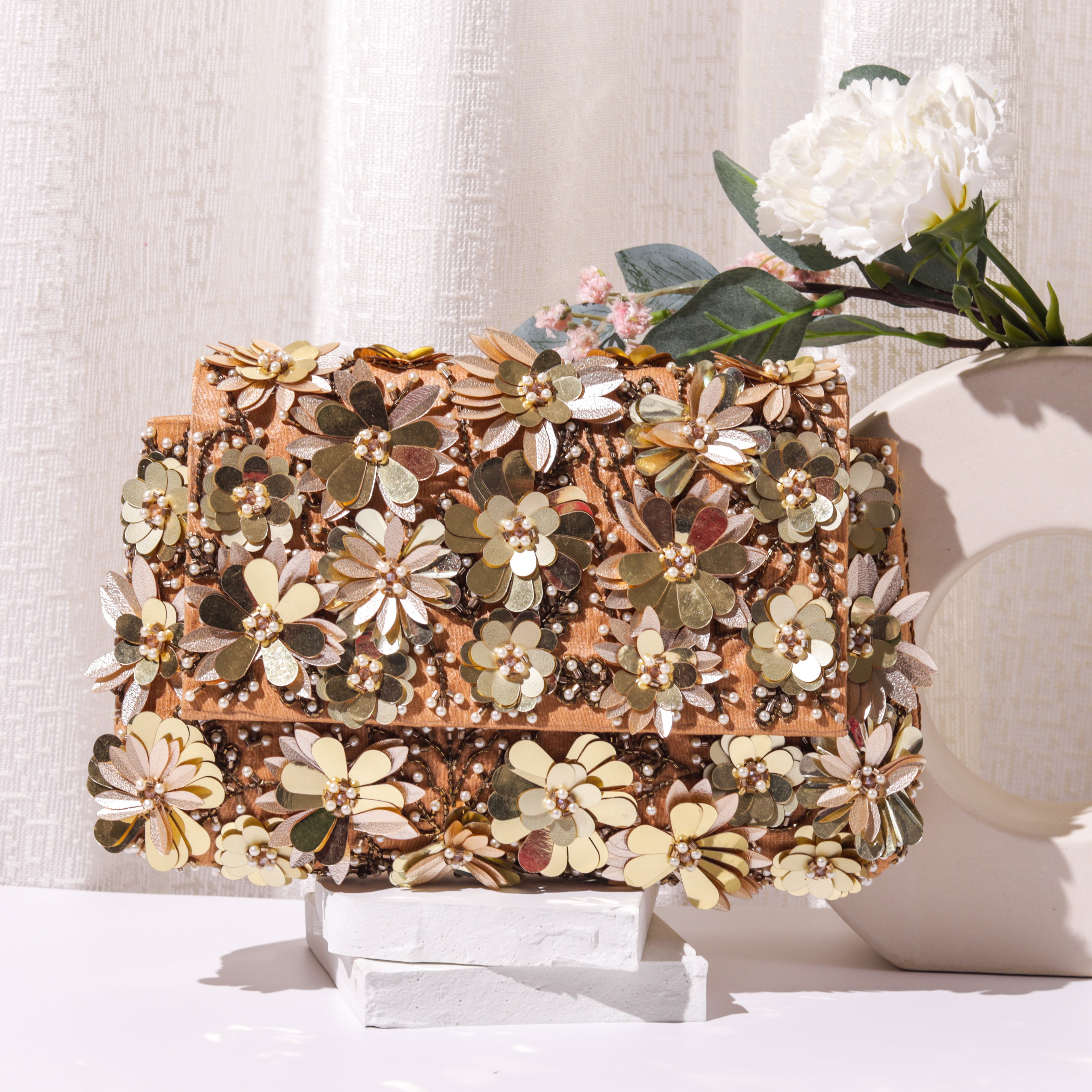 Flower striker clutch