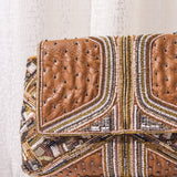 Theiya tan clutch