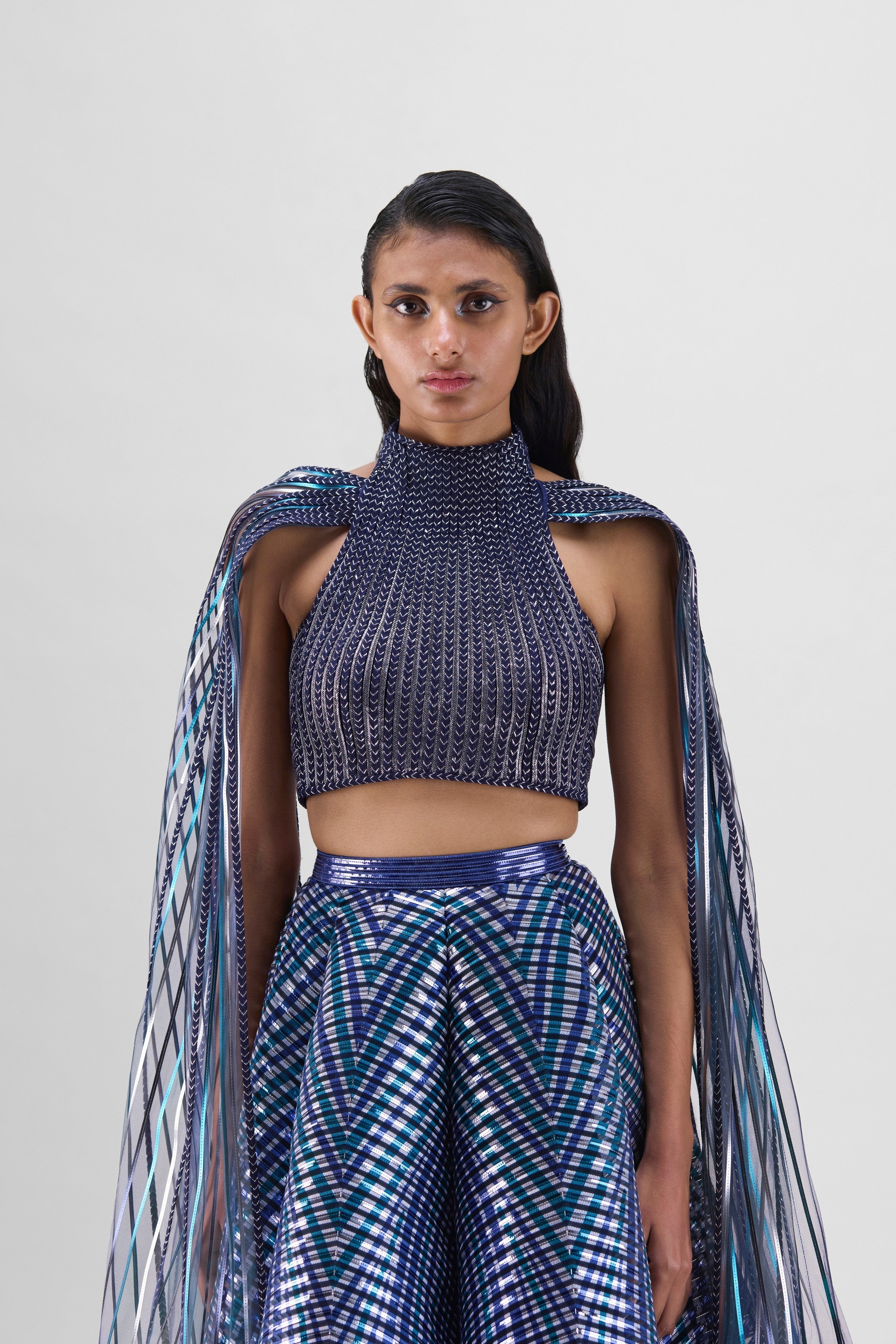 METALLIC BRAIDED HALTER TOP WITH A FLUTED TULLE PRINTED SKIRT