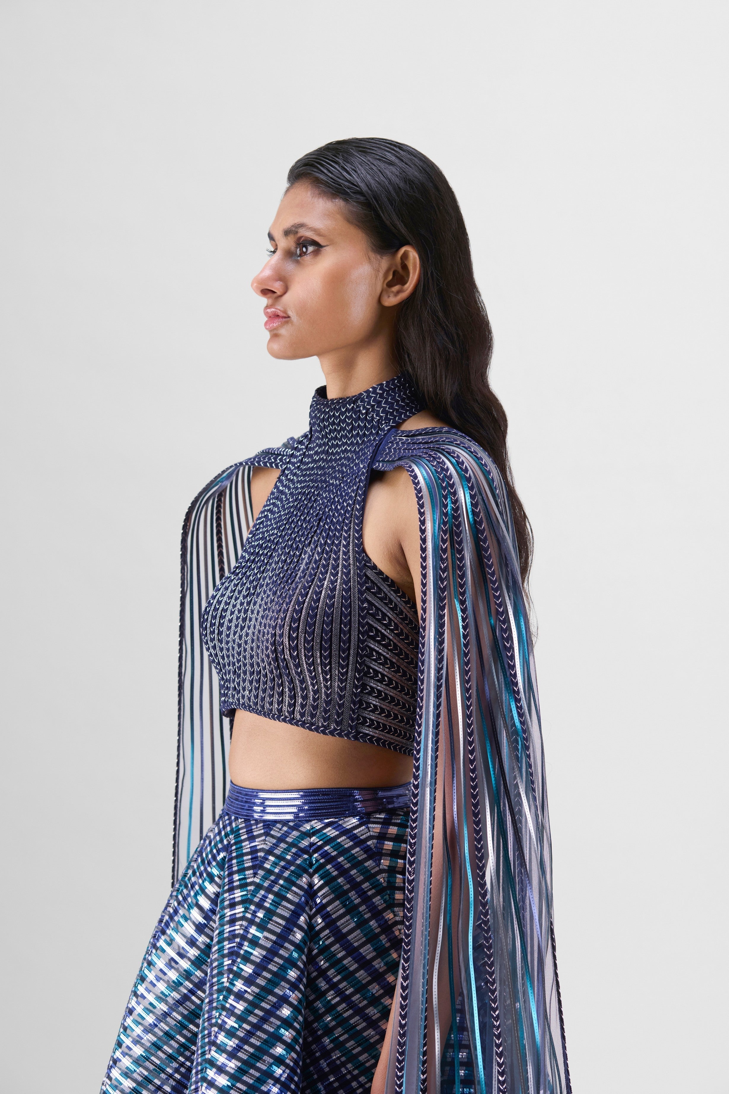 METALLIC BRAIDED HALTER TOP WITH A FLUTED TULLE PRINTED SKIRT