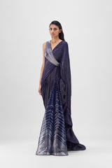 METALLIC STRUCTURED GOWN WITH RUFFLE BRAIDED DRAPE