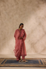 Peach chanderi heavy neckline resham embroidred kurta paired with organic cotton slip,pant & heavy border dupatta
