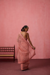 Peach organza embroidered saree comes with unstitched & unembroidered blouse fabric in chanderi