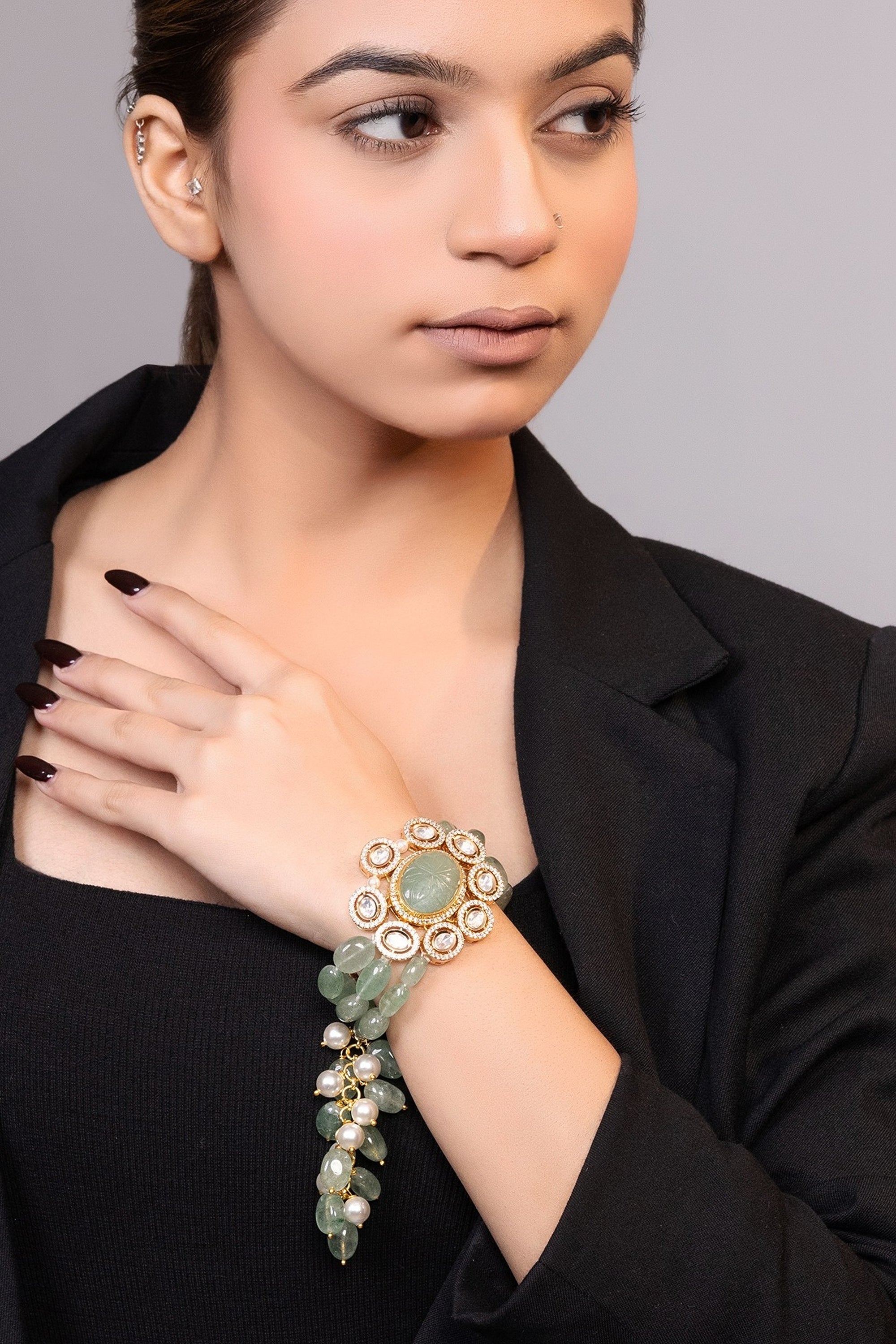 LE TIERAN GOLD PLATED GREEN BEADS AND MOISSANITE STUDDED BRACELET
