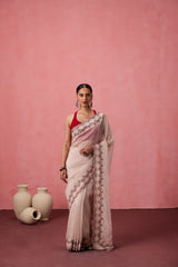 Classic white organza jaal embroidered saree comes with unstitched & unembroidered blouse fabric in chanderi