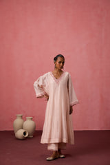 Cozy peach chanderi floral resham embroidered kurta paired with organic cotton slip, pant & organza dupatta