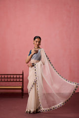 Ivory organza heavy scalloped cutwork embroidered saree comes with unstitched & unembroidered blouse fabric in chanderi