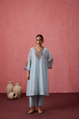 Sky blue chanderi dori work and french knot embroidered kurta paired with organic cotton slip, pant & organza dupatta