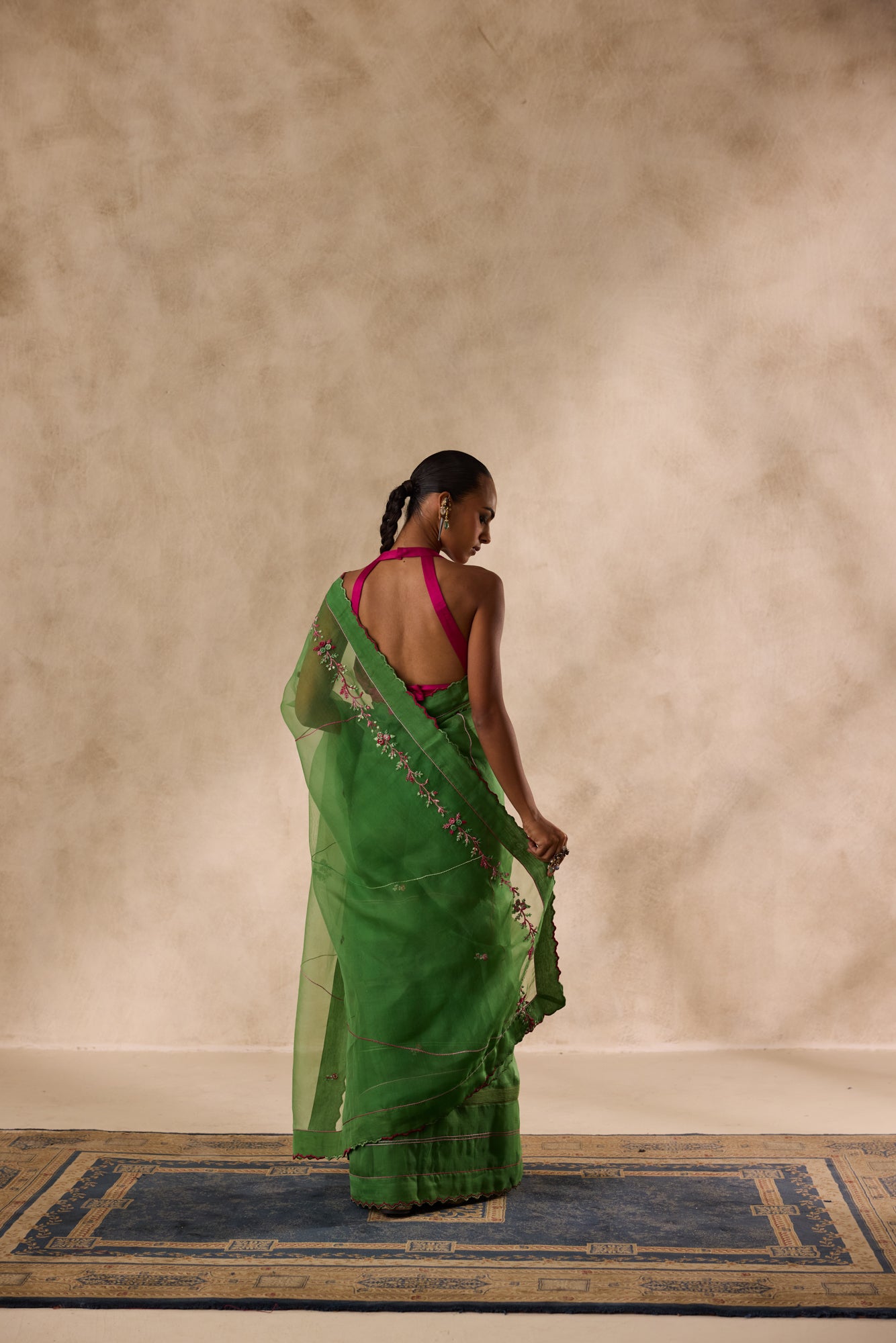 Green organza embroidered saree comes with unstitched & unembroidered blouse fabric in chanderi