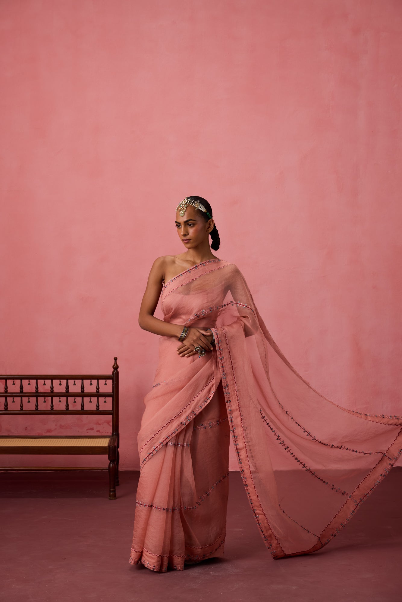 Peach organza embroidered saree comes with unstitched & unembroidered blouse fabric in chanderi