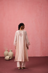 Cozy peach chanderi dori work  and resham embroidered kurta paired with organic cotton slip, pant & organza dupatta