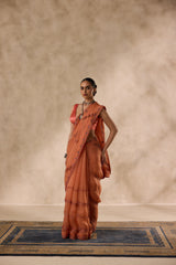 Peach organza scalloped embroidered saree comes with unstitched & unembroidered blouse fabric in chanderi