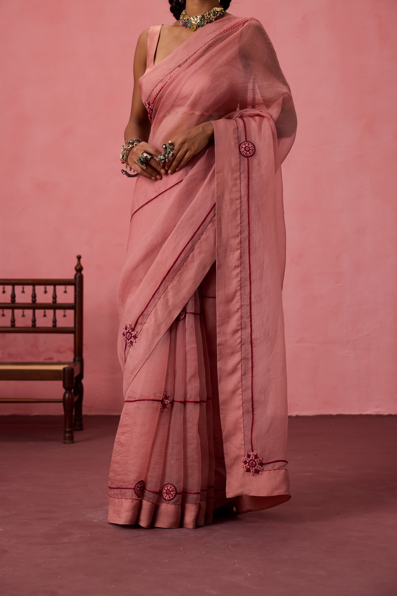 Peach organza embroidered saree comes with unstitched & unembroidered blouse fabric in chanderi